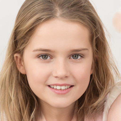 Joyful white child female with long  brown hair and brown eyes