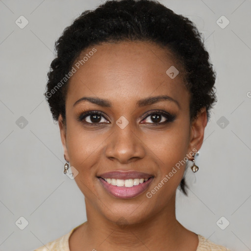 Joyful black young-adult female with short  black hair and brown eyes