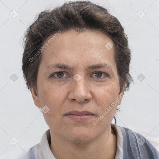 Joyful white adult female with short  brown hair and brown eyes