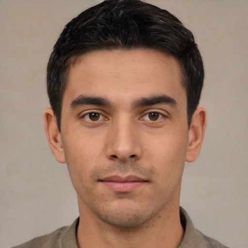 Neutral white young-adult male with short  black hair and brown eyes