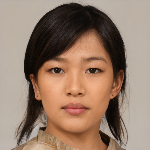 Neutral asian young-adult female with medium  brown hair and brown eyes