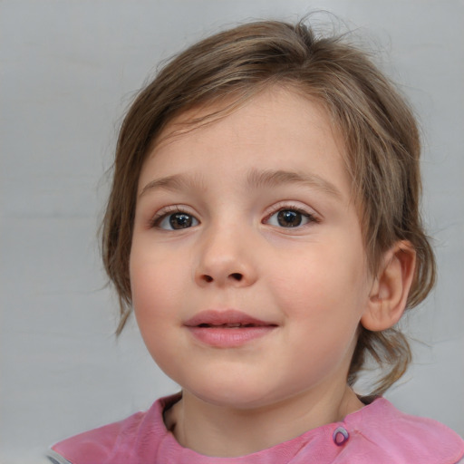 Joyful white child female with medium  brown hair and blue eyes