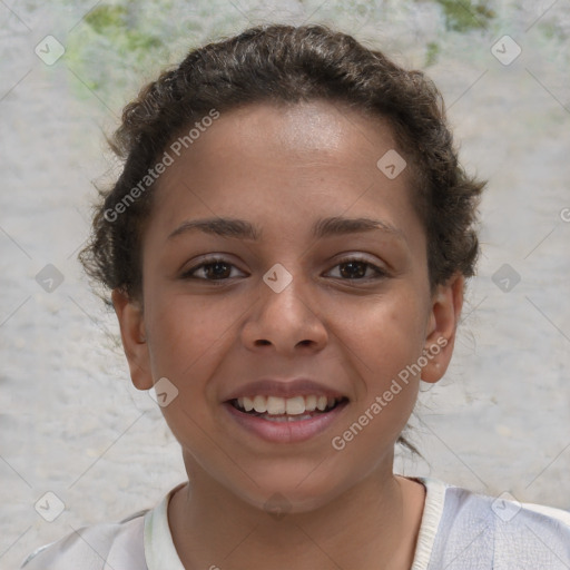 Joyful white child female with short  brown hair and brown eyes