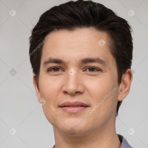 Joyful white young-adult male with short  brown hair and brown eyes