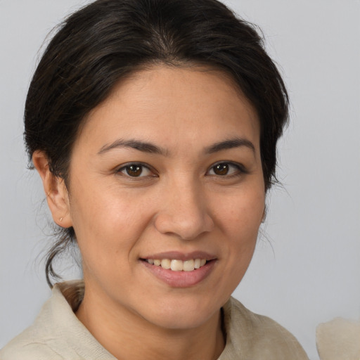 Joyful white young-adult female with medium  brown hair and brown eyes