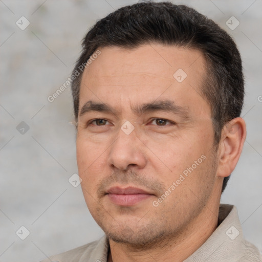 Joyful white adult male with short  brown hair and brown eyes