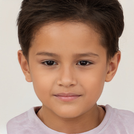 Joyful white child female with short  brown hair and brown eyes