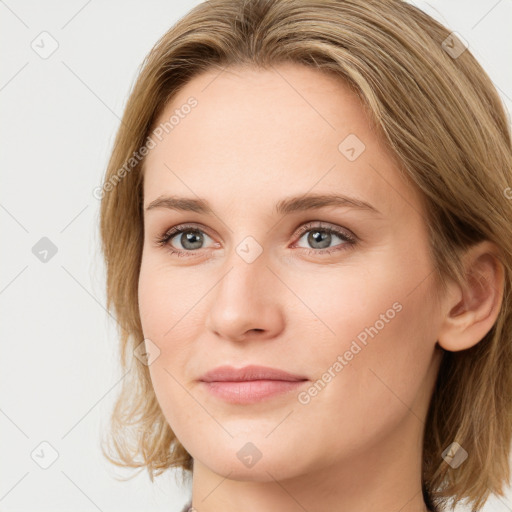 Joyful white young-adult female with medium  brown hair and blue eyes