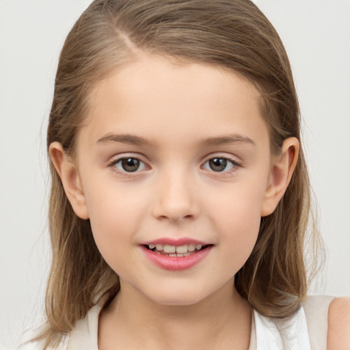 Joyful white child female with medium  brown hair and brown eyes