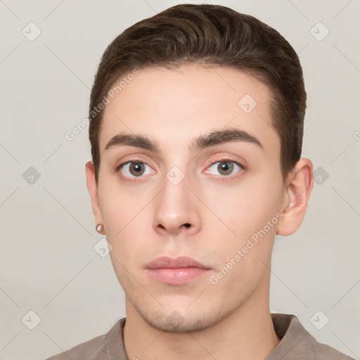 Neutral white young-adult male with short  brown hair and brown eyes