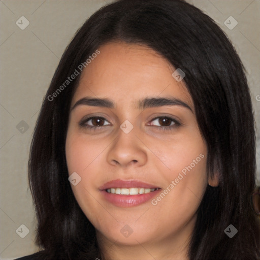 Joyful white young-adult female with long  black hair and brown eyes