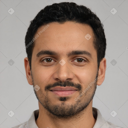 Joyful latino young-adult male with short  black hair and brown eyes