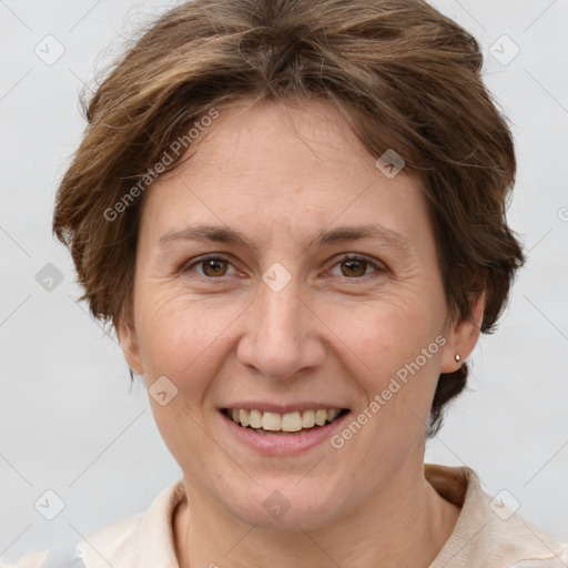 Joyful white adult female with short  brown hair and brown eyes