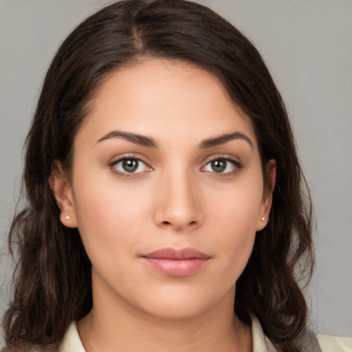 Neutral white young-adult female with medium  brown hair and brown eyes