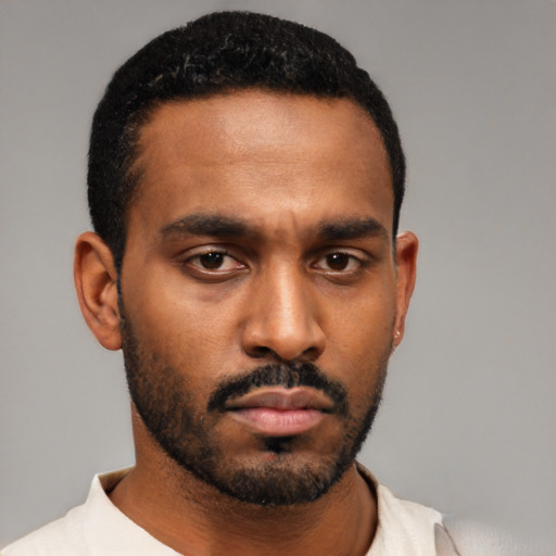 Neutral black young-adult male with short  black hair and brown eyes