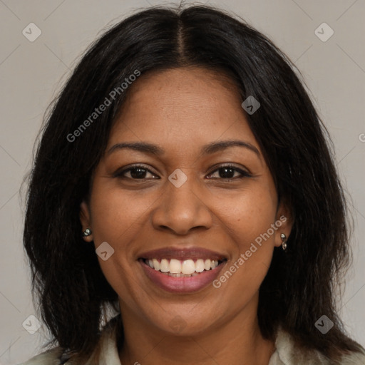 Joyful black young-adult female with medium  brown hair and brown eyes