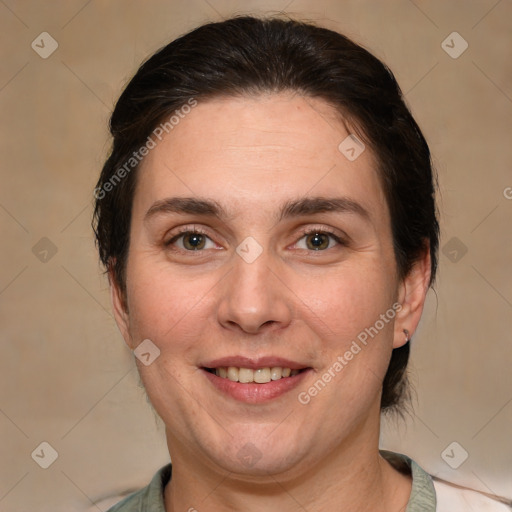 Joyful white adult female with medium  brown hair and brown eyes