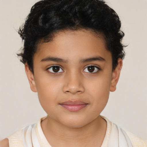 Joyful latino child female with short  brown hair and brown eyes