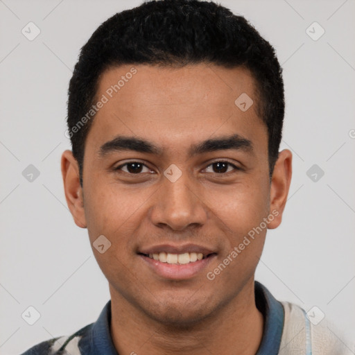 Joyful latino young-adult male with short  black hair and brown eyes