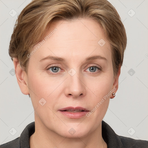 Joyful white adult female with short  brown hair and grey eyes