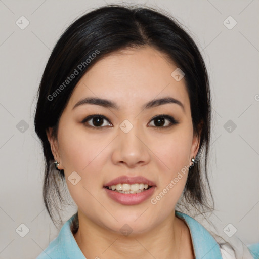 Joyful asian young-adult female with medium  black hair and brown eyes