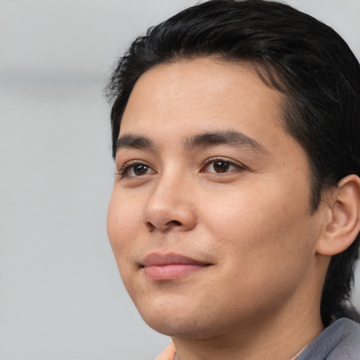 Neutral white young-adult male with short  black hair and brown eyes