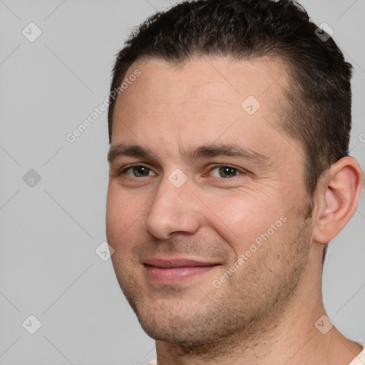 Joyful white young-adult male with short  brown hair and brown eyes