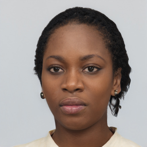 Neutral black young-adult female with short  black hair and brown eyes