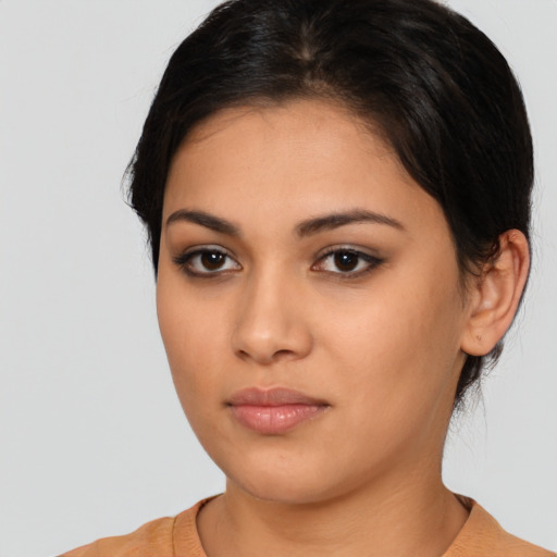 Neutral latino young-adult female with medium  black hair and brown eyes