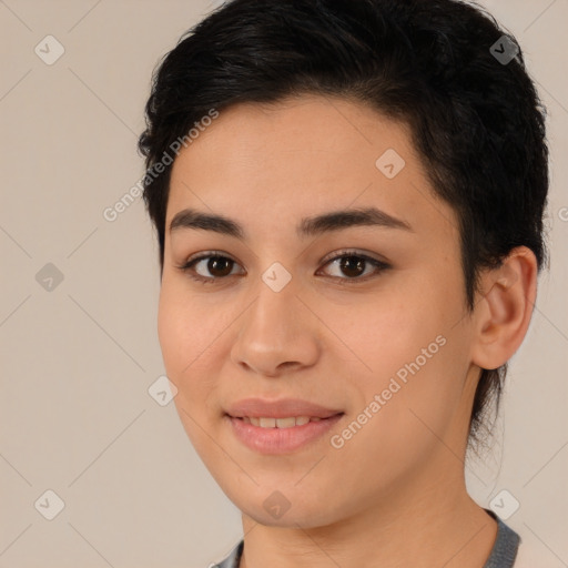 Joyful latino young-adult female with medium  brown hair and brown eyes