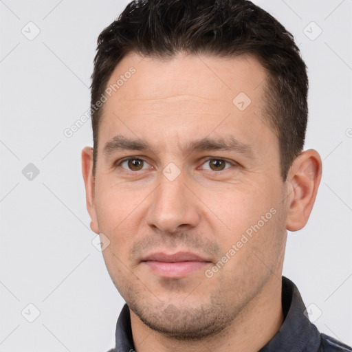 Joyful white young-adult male with short  brown hair and brown eyes