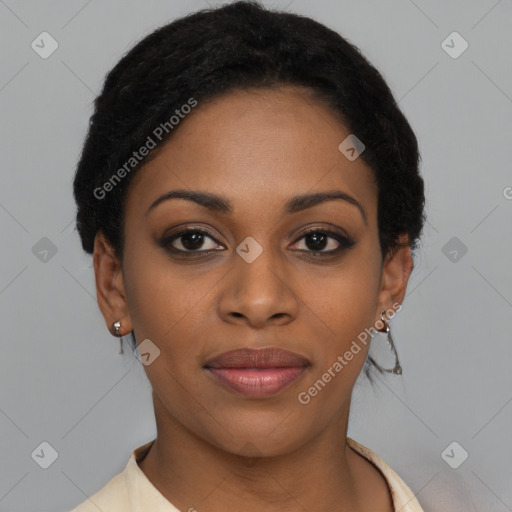 Joyful black young-adult female with short  black hair and brown eyes