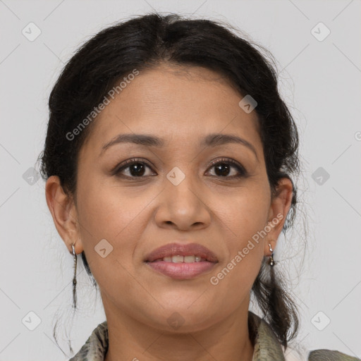 Joyful latino young-adult female with medium  brown hair and brown eyes