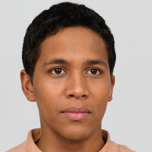 Neutral latino young-adult male with short  brown hair and brown eyes