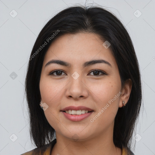 Joyful asian young-adult female with long  brown hair and brown eyes