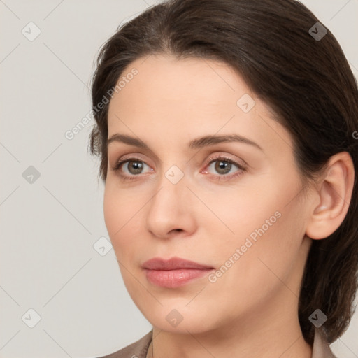 Neutral white young-adult female with medium  brown hair and brown eyes