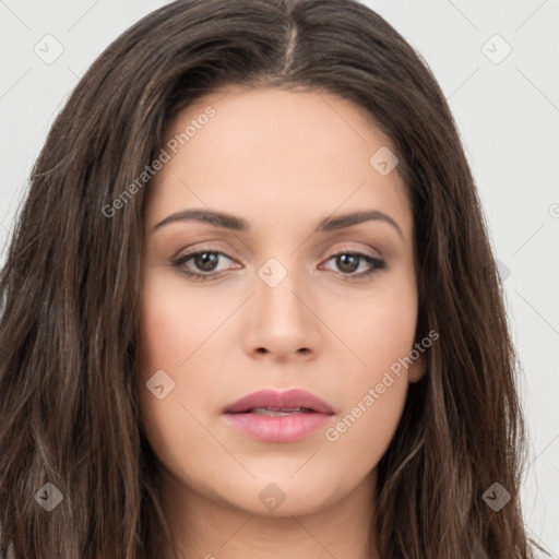 Neutral white young-adult female with long  brown hair and brown eyes