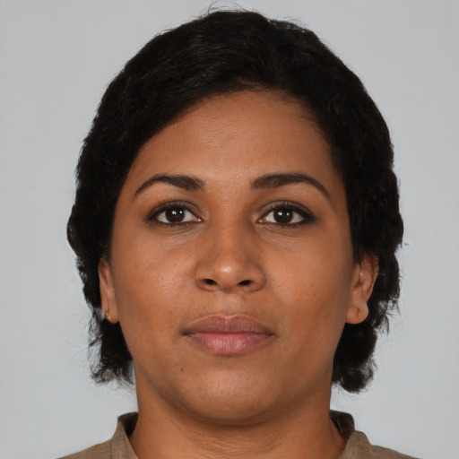 Neutral latino young-adult female with short  brown hair and brown eyes