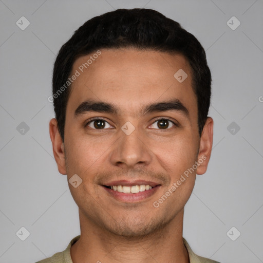 Joyful white young-adult male with short  black hair and brown eyes