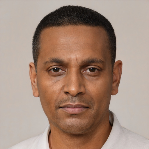 Neutral black adult male with short  black hair and brown eyes