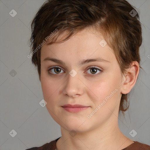 Joyful white child female with medium  brown hair and brown eyes