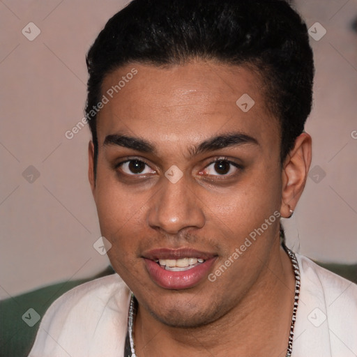 Joyful white young-adult male with short  black hair and brown eyes