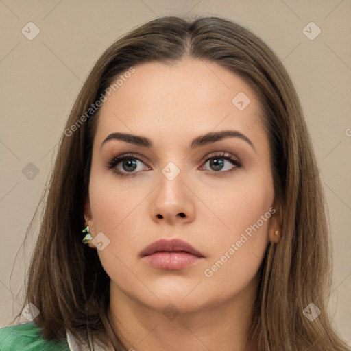 Neutral white young-adult female with long  brown hair and brown eyes