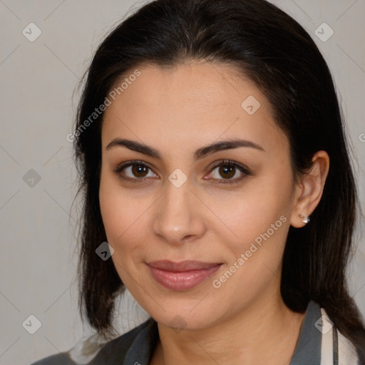 Joyful latino young-adult female with medium  brown hair and brown eyes