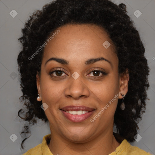 Joyful black young-adult female with medium  brown hair and brown eyes