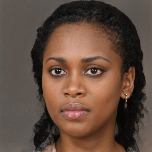 Neutral black young-adult female with long  black hair and brown eyes