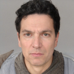Neutral white adult male with short  brown hair and brown eyes