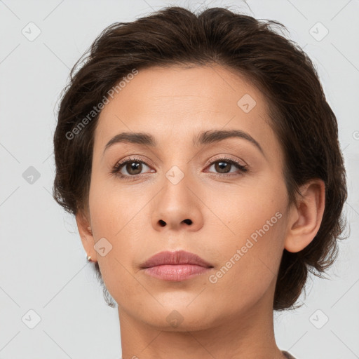 Neutral white young-adult female with medium  brown hair and brown eyes