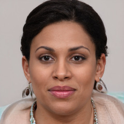 Joyful white adult female with short  brown hair and brown eyes