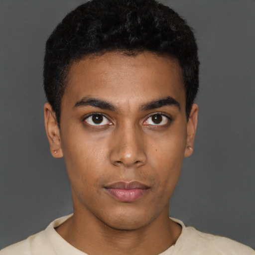 Neutral black young-adult male with short  black hair and brown eyes